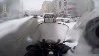 POV Riding a Motorcycle in the Snow