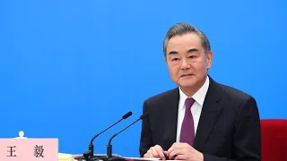 State Councilor and Foreign Minister Wang Yi meets the press