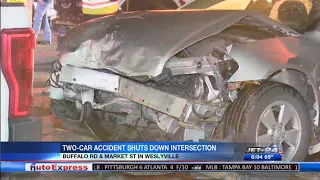 Two-car accident shuts down busy intersection Thursday evening