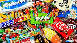 a Lots Of Top Candy, Snickers, Skittles, Kinder Joy And More Sweets Chocolate Candy