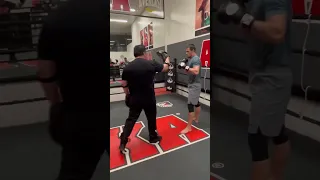 Usman Numargomedov Bellator Champ doing pad work Javier Mendez