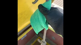 Lowering heavy tools with a rope