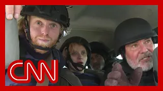 CNN crew has close call with artillery fire