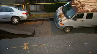 Crews work to repair giant sinkhole that swallowed Bronx van