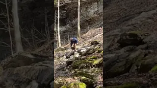 Old man climbing down falls