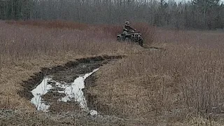 Bombardier traxter 500cc 4 wheeler in mud
