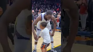 Father-Son love. Draymond and his son get hyped after Christmas Dub.