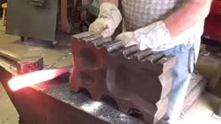 Forging a gun barrel