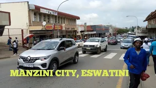 PEOPLE LIVE LARGE LIVES IN MANZINI CITY IN THE KINGDOM OF ESWATINI.