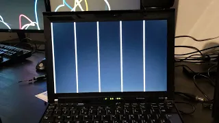My librebooted Thinkpad x200 running OpenBSD (crazy video artifacts)