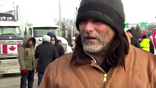 Canada police begin clearing protesters blocking bridge