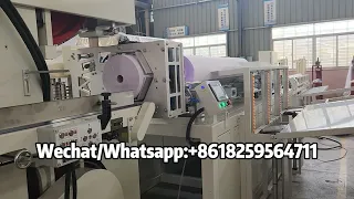 Maxi paper roll rewinding machine and cutting machine