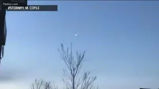 Rare, vivid green fireball streaks across the morning sky