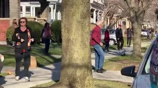 Neighbors Come Out and Dance Together at Safe Distance During Lockdown