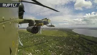 Russian combat helicopters in firing drill action caught on action cam