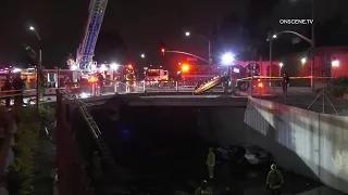 Driver Hoisted After Flying Into Flood Control Channel | West Covina