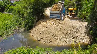 Really Great Operator  Bulldozer Working Push Stone & Dump Truck Unloading Stone Filling into Water