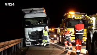 VN24 - Truck gets stuck behind concrete edge - long recovery operation