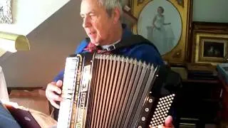 Swiss Mountain Man tries again on his accordion.