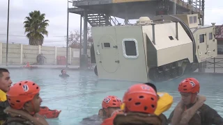 AAV Marines Tackle Submerged Vehicle Egress Trainer