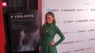 Video: Olivia Wilde sparkles in a green gown at 'A Vigilante' premiere