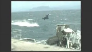 Jet Fighter Low Pass Fly By French Dassault Rafale Plane in Near Miss Aircraft Flies over Sea Water