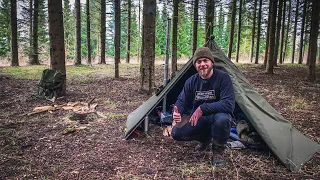 Solo bushcraft lavvu camping, with a wood stove.