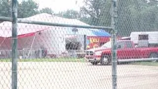 Distressed elephant tied up at the circus.