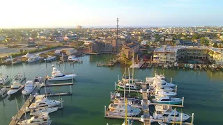 drone flying in Port Aransas, over the  Port Aransas Marina and the Chapel on the Dunes