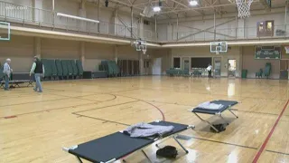 Warming shelters give beds and meals for homeless as temperatures drop below freezing overnight