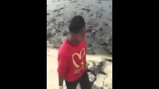 Fearless Men Feed A Bunch Of Hungry Crocodiles!