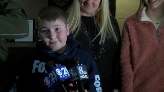 Marine surprises little brother during Hershey, Pa. hockey game