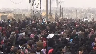 Thousands flee rebel-held areas of Aleppo