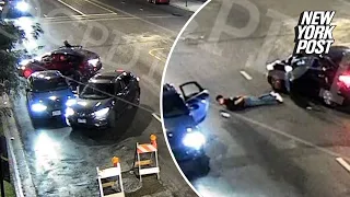 Shocking video shows carjackers forcing Audi driver out at gunpoint in crime-ridden Chicago