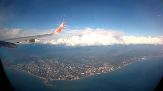 Вид из иллюминатора самолета. Взлет из аэропорта г.Сочи