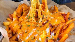 PASTRAMI FRIES LOADED WITH MELTED CHEESE AND HOT SAUCE!!