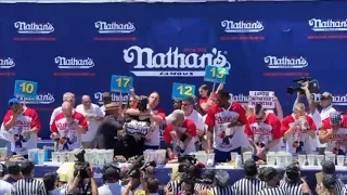 Joey Chestnut Chokes Protestor During Nathan's Hot dog Eating Contest 2022