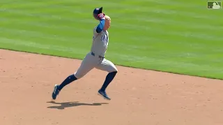 Batter Runner Holds Helmet in Hand Touches Base with Helmet