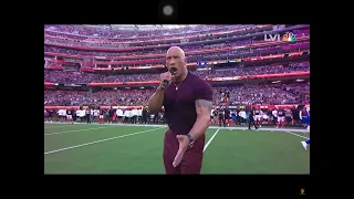 The rock sing face off at a super bowl