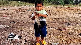 Cute Baby Saving a Fish | Heart Touching Video | Save Fishes | Bingi Ronith Aryan | Naven