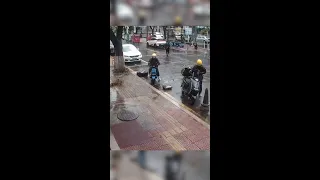 Two Scooter Riders Dodge Disaster During Storms