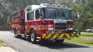 Orange County Fire Rescue units responding to a working house fire in Isle of Pines