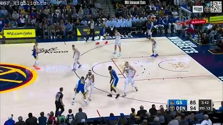 Nikola Jokic shows Steph Curry that he's going to kick the ball if he throws a pocket pass