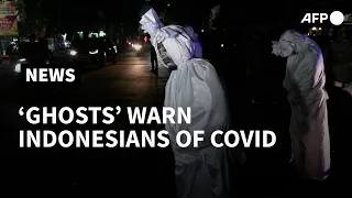 'Ghosts' scare people into respecting Covid-19 restrictions in Indonesia | AFP