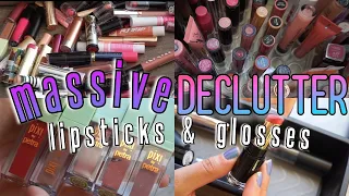 INSANE LIPSTICK & LIPGLOSS DECLUTTER!! I DECLUTTERED EVERYTHING!! | DOWNSIZING MY MAKEUP COLLETION