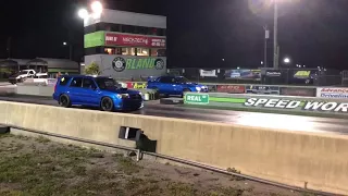 Subaru Forester vs Subaru STi drag race