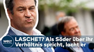 WAHLPROGRAMM DER UNION: "Ich kann sagen, dass die Welt zwischen uns heil ist", sagt Söder und lacht