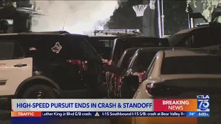 High-speed pursuit ends in crash and standoff