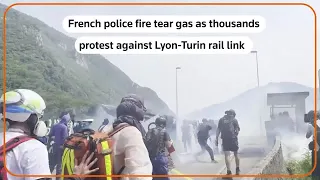 French police fire tear gas at rail-link protest