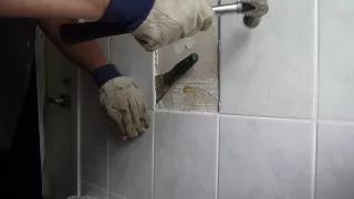 removing bathroom tiles